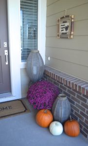 Click here to take a tour of a purple and orange fall front porch. Welcome!