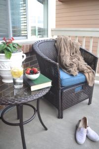 Spring front porch makeover with furniture and plants, front porch before and after.
