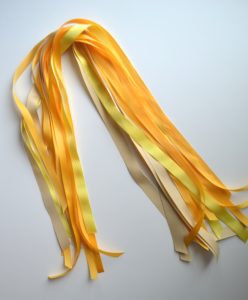 diy ribbon garland, embroidery hoop diy, easy ribbon party decor, yellow party decor, ribbon hoop garland tutorial