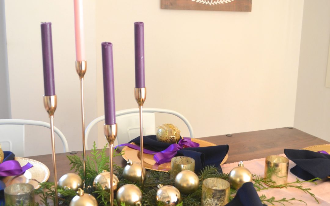 A festive tablescape using advent colors, pink and purple table decorations. Advent decorations, place settings, and centerpiece ideas
